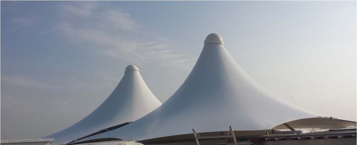 Signature cone canopies at ADNOC service stations by Al Hamra Industries