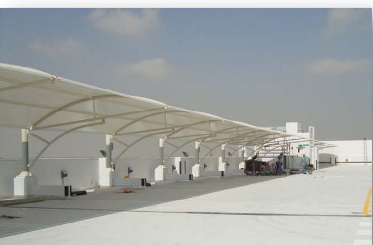 Continuous cantilever shade structure at Abu Dhabi airport Terminal 3 car park