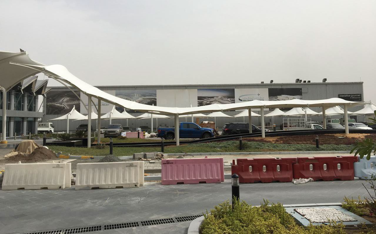 Wave-form tensile entrance canopy at Abu Dhabi Bateen Airport forecourt