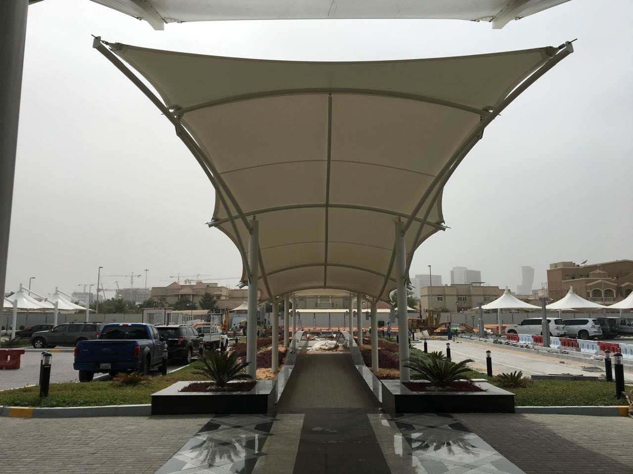 Tensile entrance shade structure at Abu Dhabi Bateen Airport
